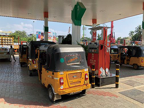 A line of vehicles at a CNG station in India