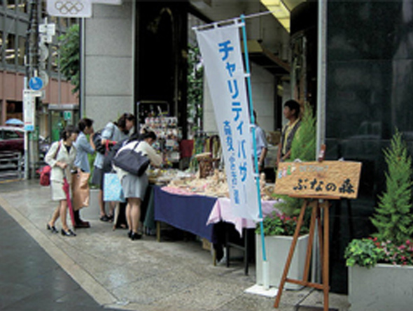 Charity bazaar held at the facade of Osaka Gas Building