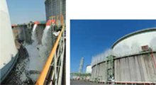 High-expansion foam discharge andwater curtain facilities along the dike around an LNG tank
