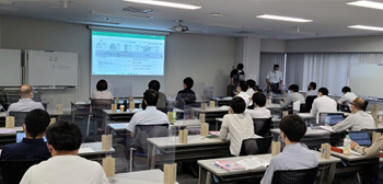As a countermeasure against COVID-19, the number of participants was reduced to half to ensure social distancing, and group discussions were conducted using PCs and a projector to avoid crowding.